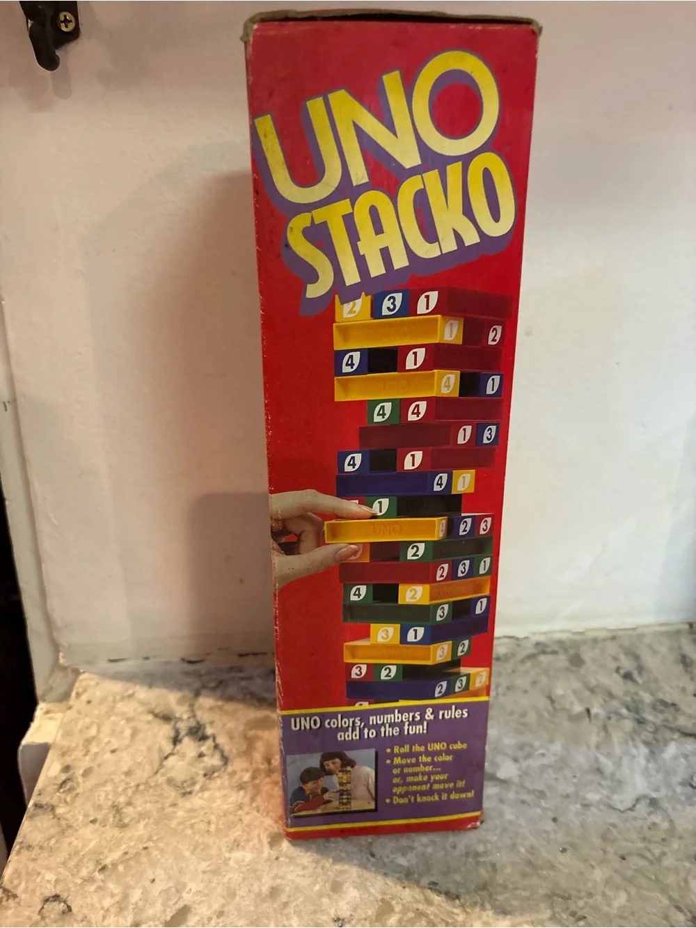 Mattel UNO Stacko Red Game Box with Yellow and Blue Elements